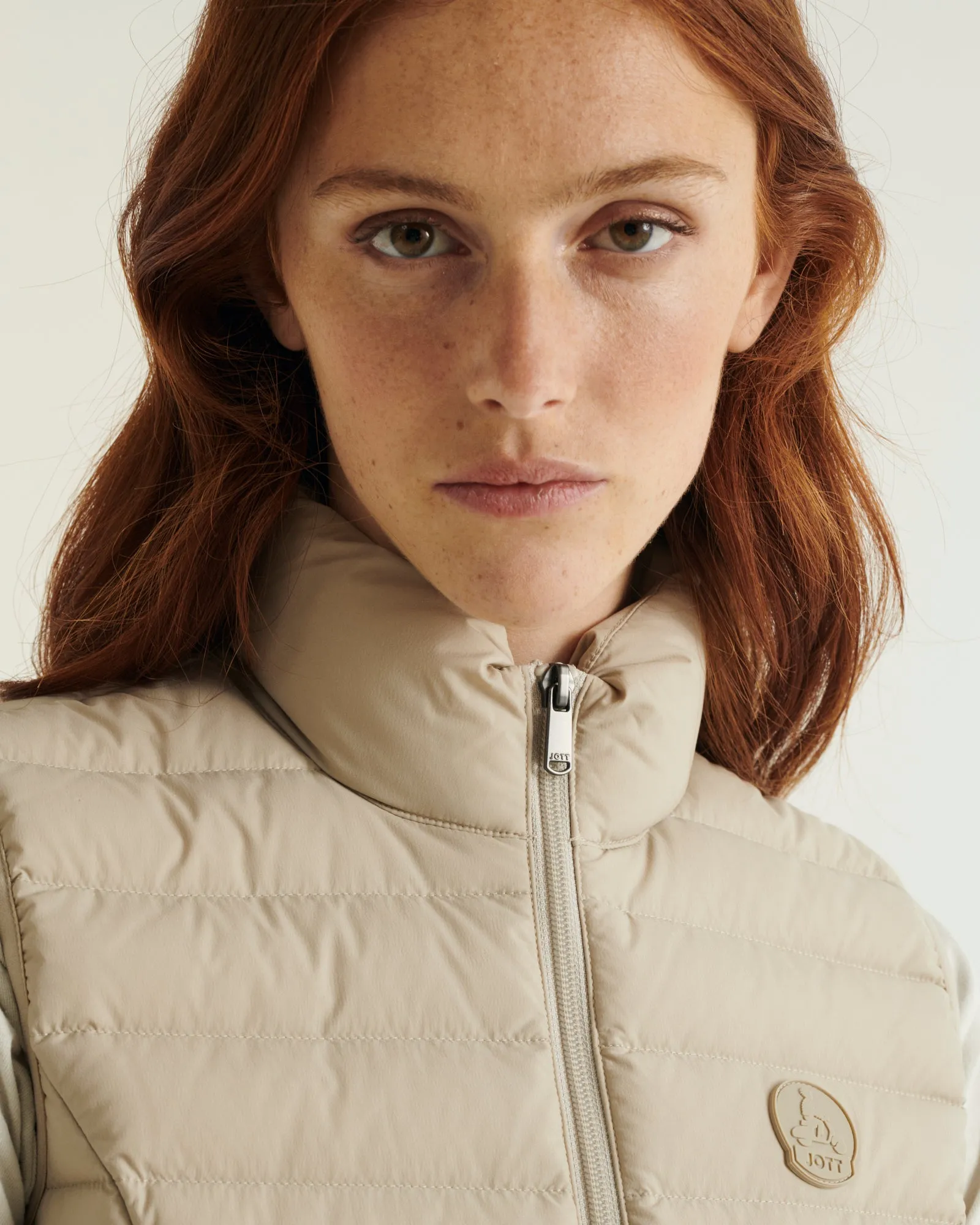 Beige Grenada stretch sleeveless puffer jacket